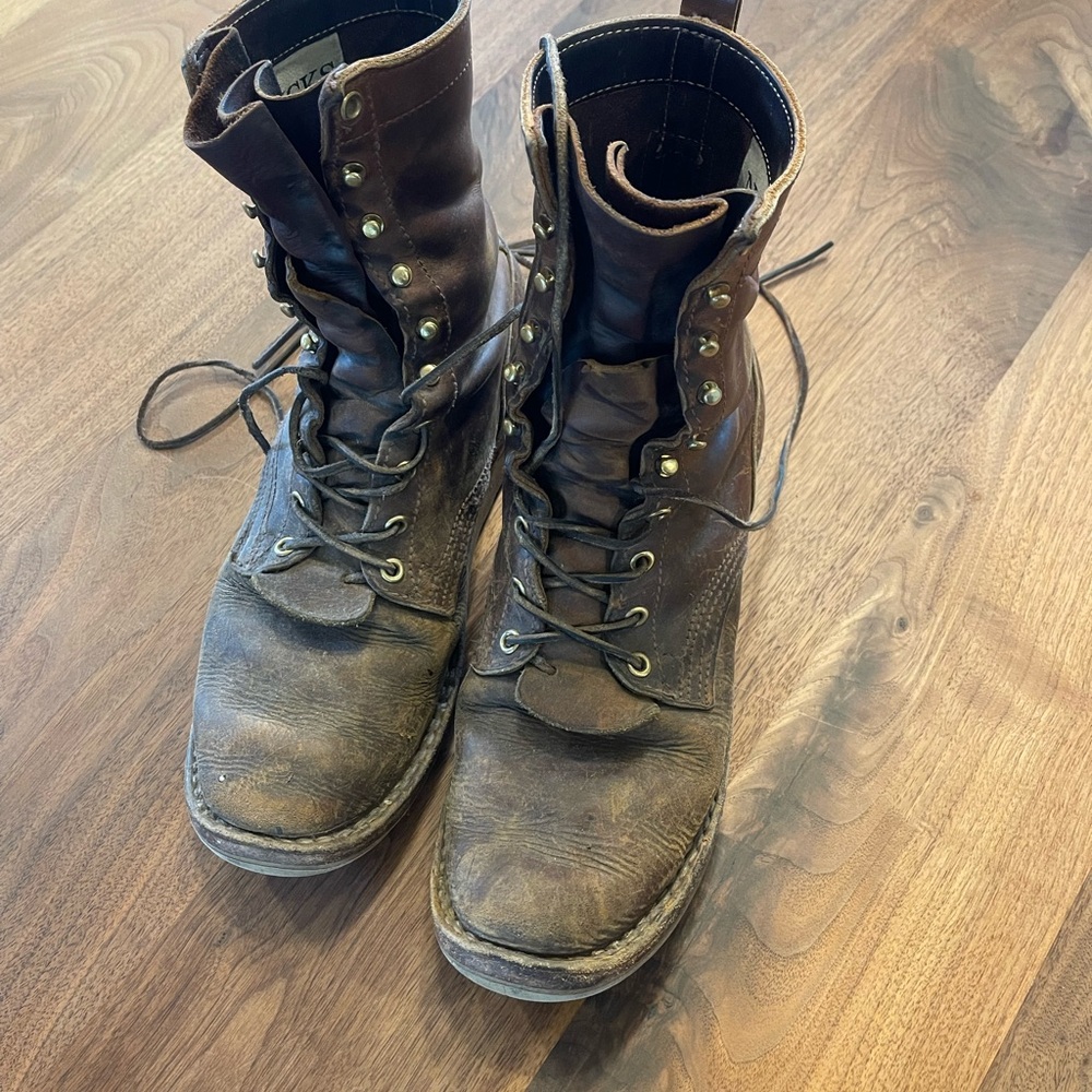 Nick’s custom high-top boots with lace-up design and sturdy sole